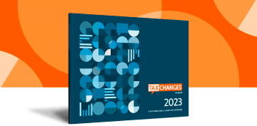2023 Tax Changes blue report with orange background