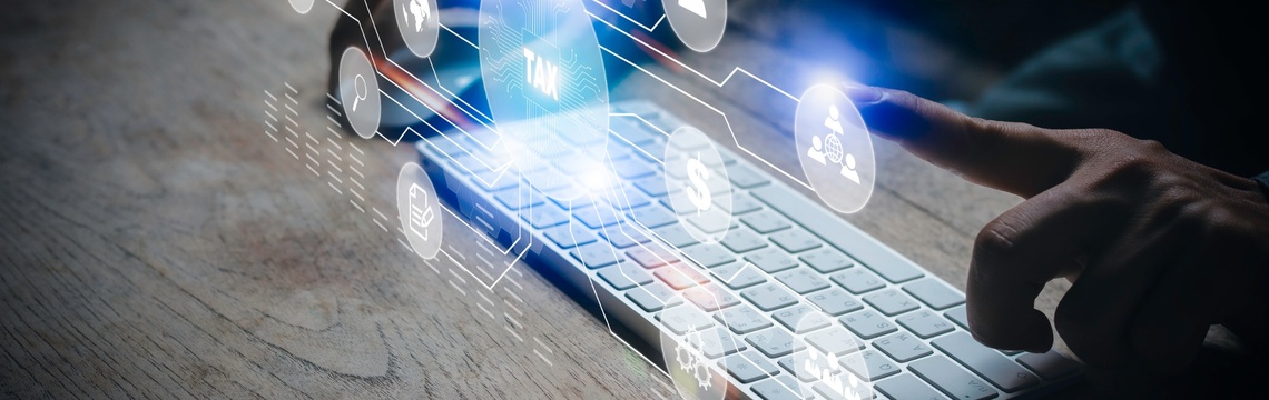 Do you have hidden communications tax exposure? Hand using a keyboard with digital icons representing tax, finance, and data connectivity.