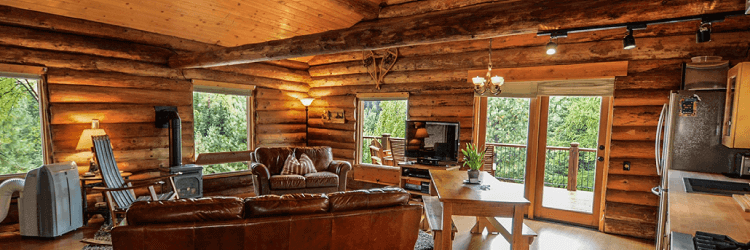 Wooden house with brown log interior.