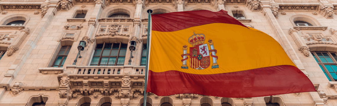 Spain flag flying outside a public building