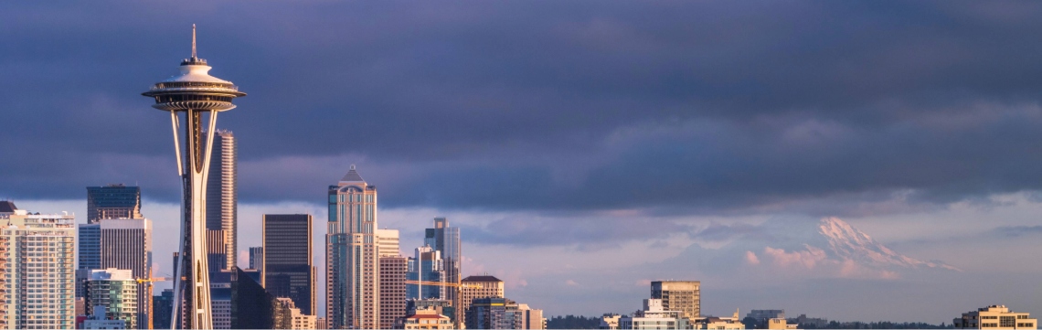 Seattle, Washington. Seattle, Washington, skyline. Mount Rainier in the background. Cloudy skies.