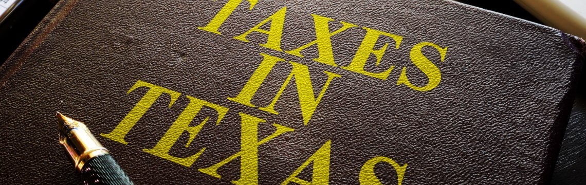 Notebook with "Taxes in Texas" on the cover