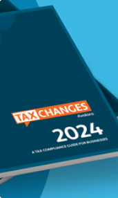 Stacked books with "Tax Changes 2024" on the top cover.