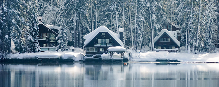 Snow-covered lakeside cabin in Truckee, California