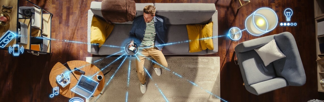 Person in home with a variety of connected devices