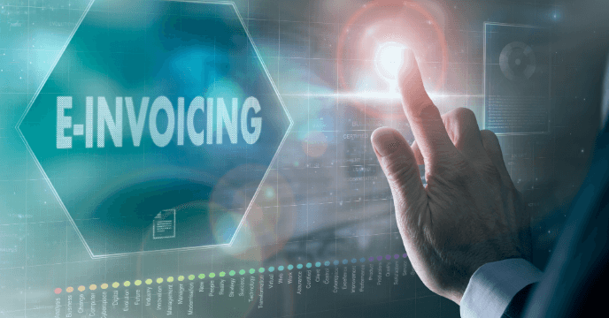 Hand touching screen that looks like virtual interface, near big button labeled “E-INVOICING”